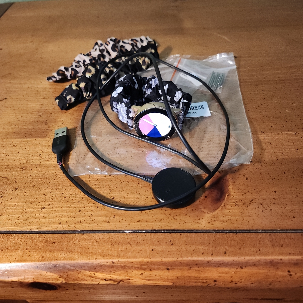 Samsung Smartwatch with Black and Gold Accents